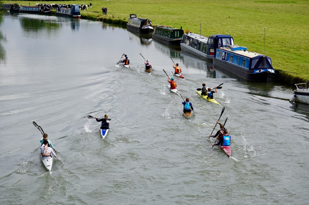 The mass start passes through the bridge